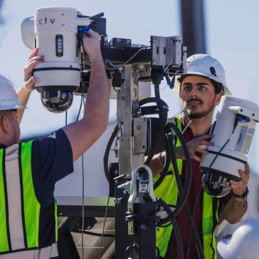 LotGuard Engineers Hooking Up Surveillance Trailer